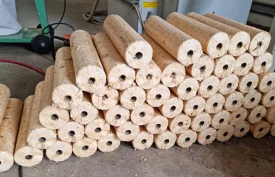 Fabricación y venta de viruta de madera para caballos y serrín en Madrid - Viruta Ricosan - Detalle fabricación de briquetas - página briquetas